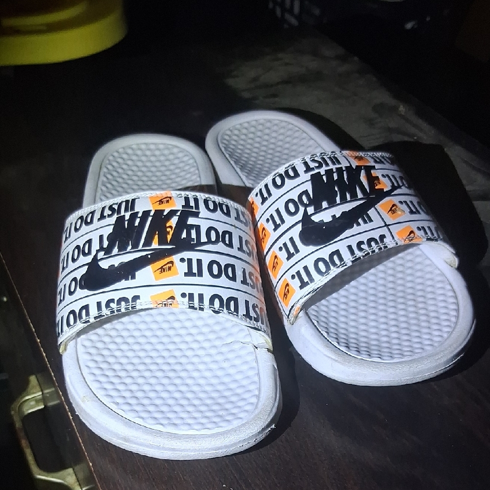Nike White Slides with Black and Orange Accents